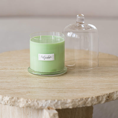 Pale greeen mint scented candle in a glass cup with a cloche in large size