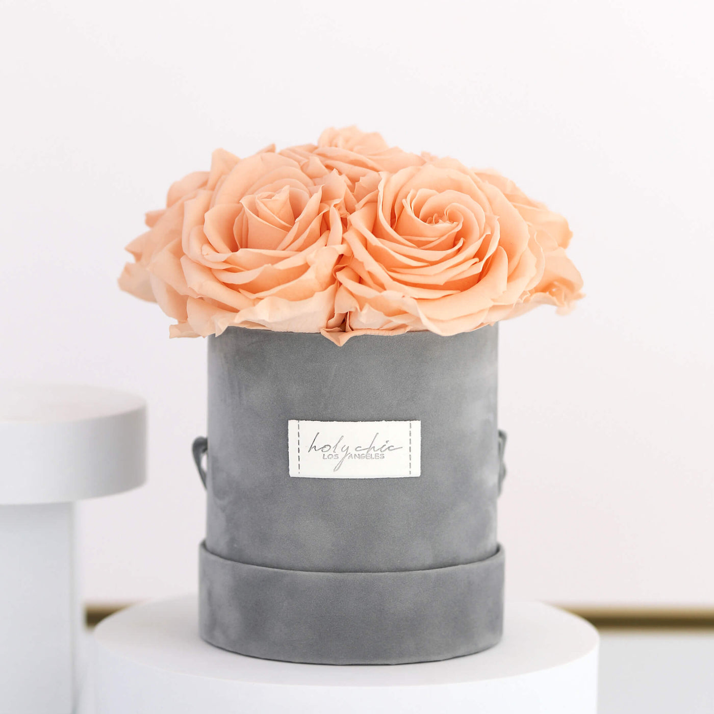 Forever roses in a suede round box