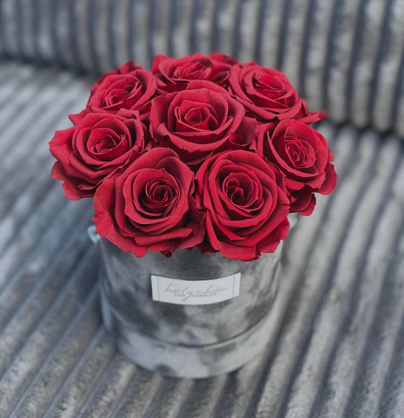 Forever roses in a suede small round box
