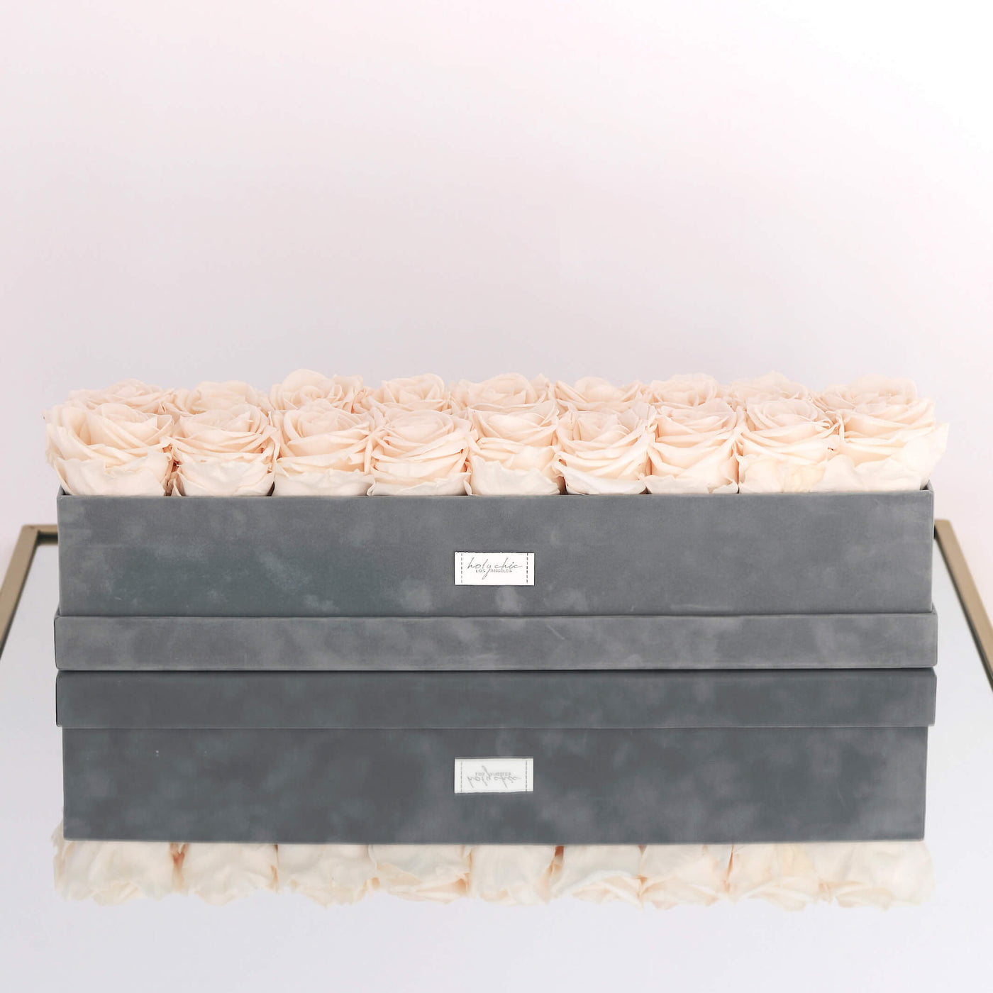 Forever roses set in a large rectangular suede box