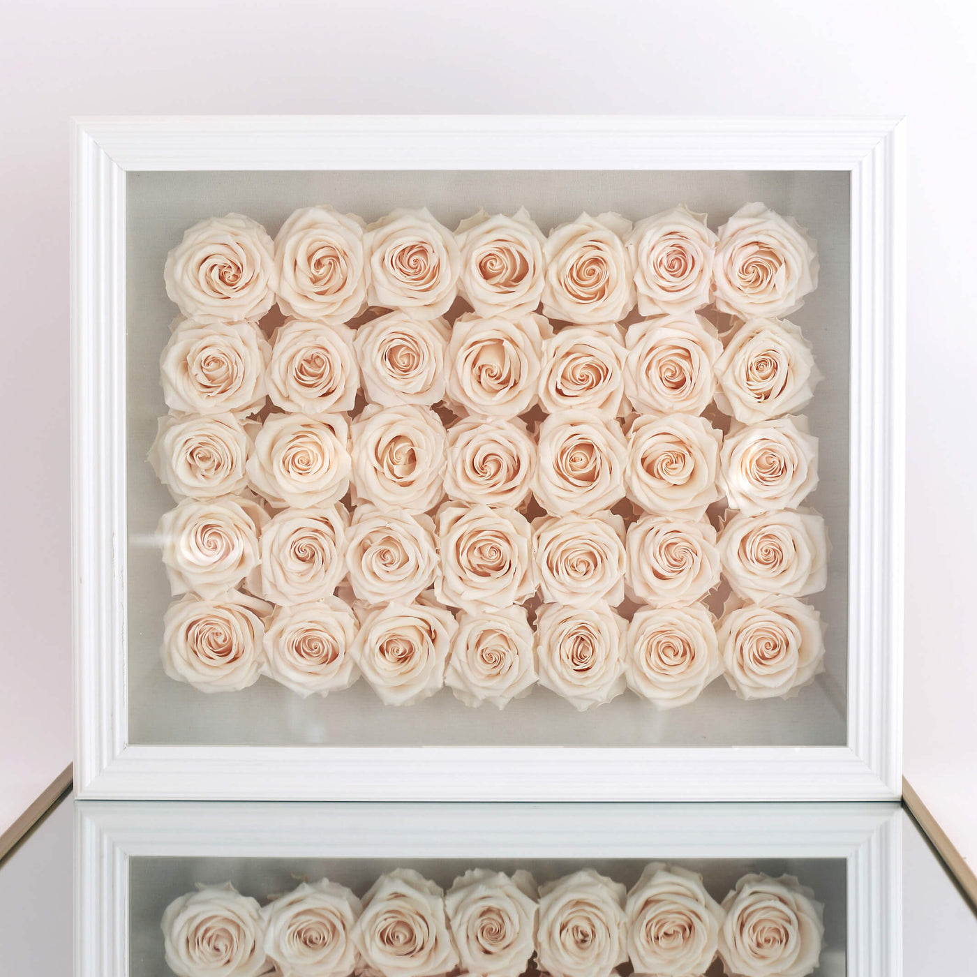 Forever roses set in a large rectangular shadow box