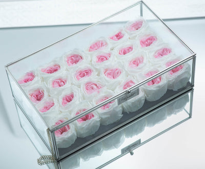 Forever roses in a clear glass jewelry box