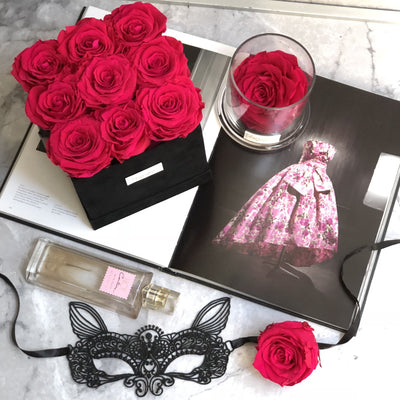 Forever roses set in a medium square suede box