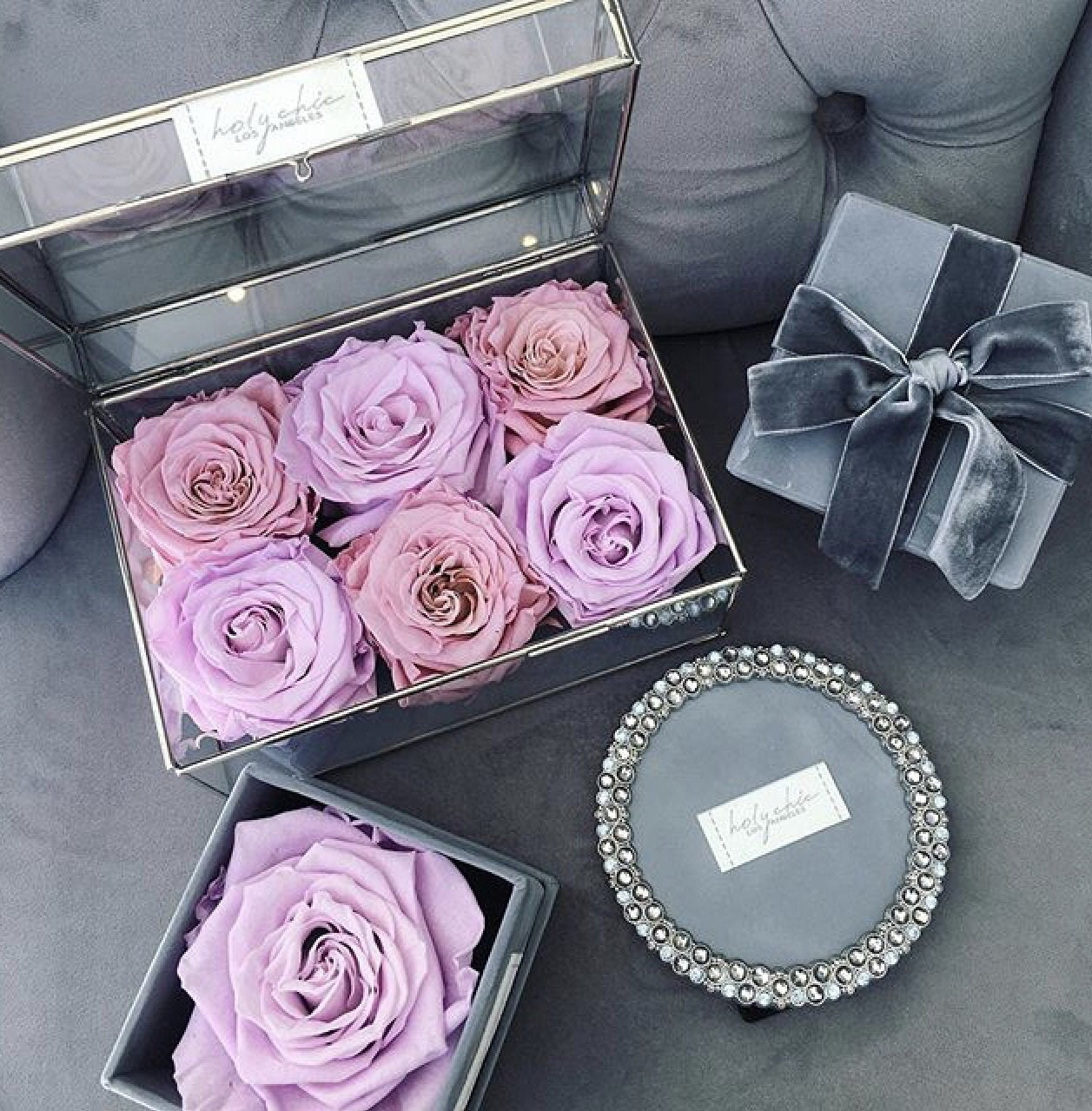 Preserved roses in a rectangular glass box