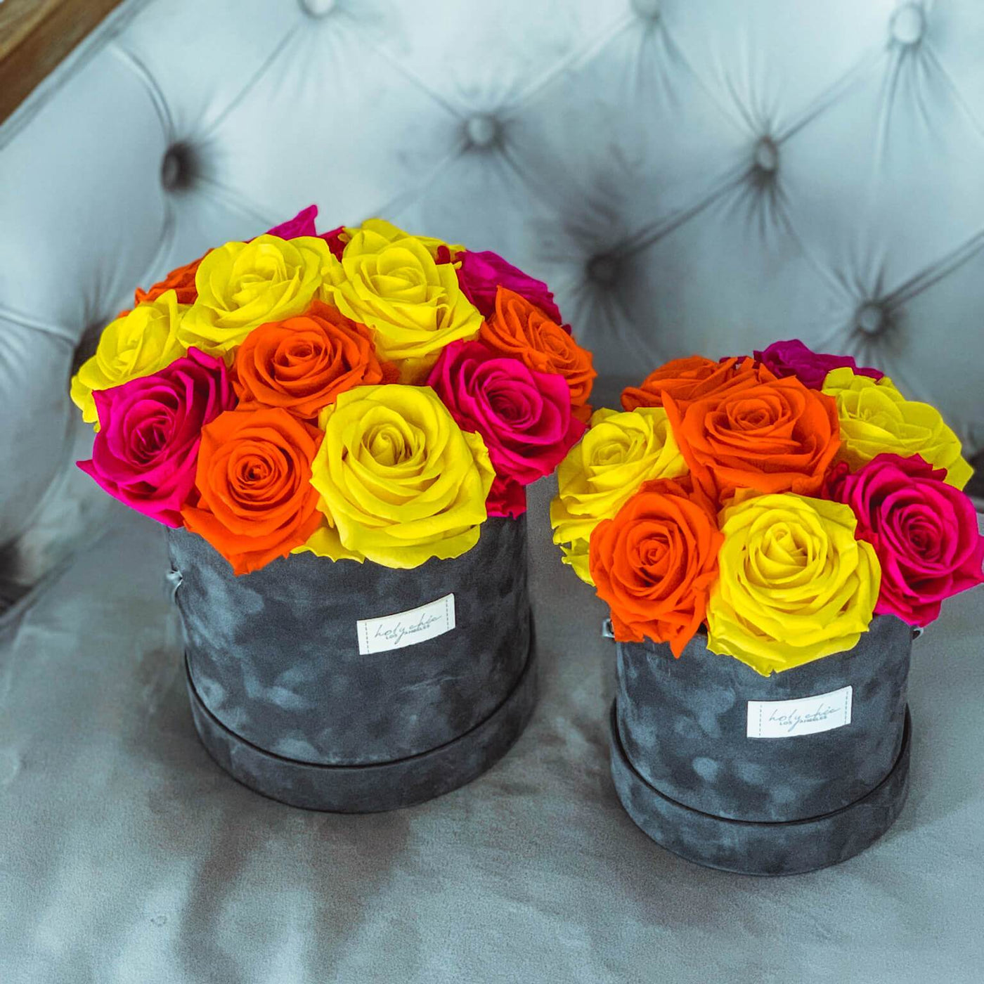 Forever roses set in a dark grey suede box